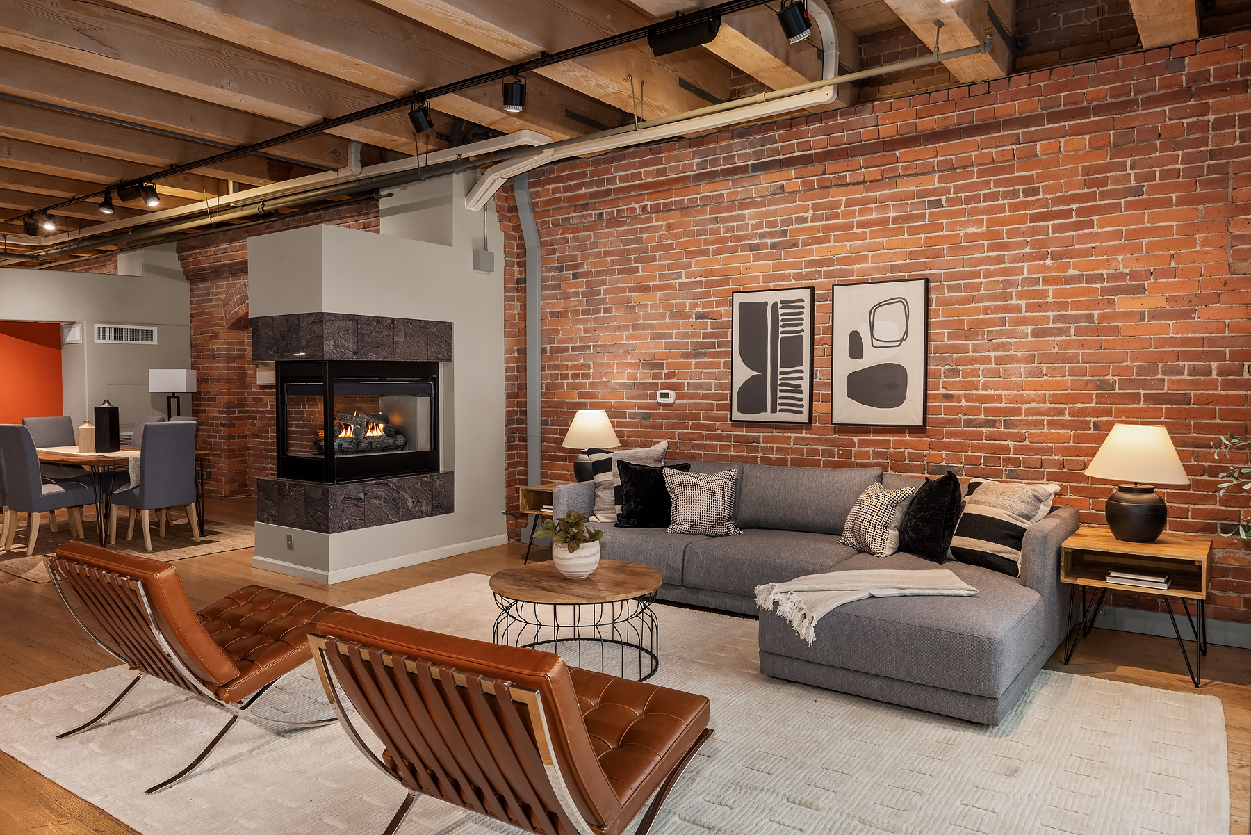 Bedroom with exposed brick accent